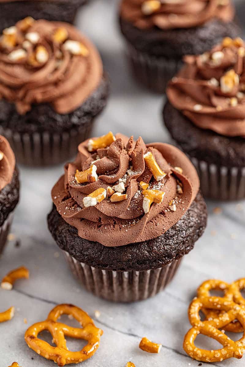Chocolate Cupcakes with Peanut Butter Filling, Whipped Chocolate Ganache, and Crushed Pretzel